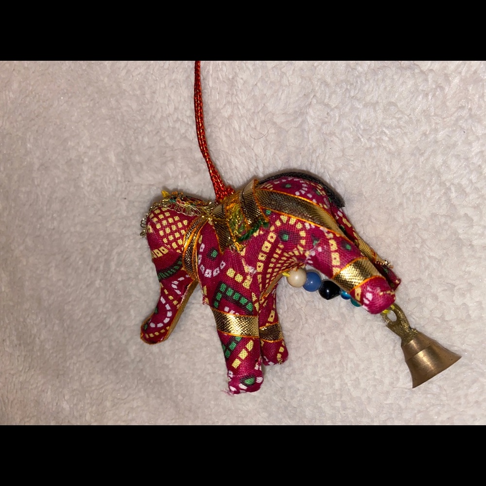 Elephant with bell attached 🐘